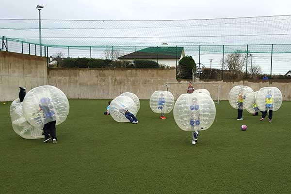 Kids Birthday party playing bubble football